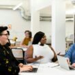 Three people in an office