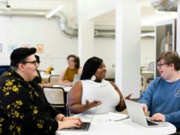 Three people in an office